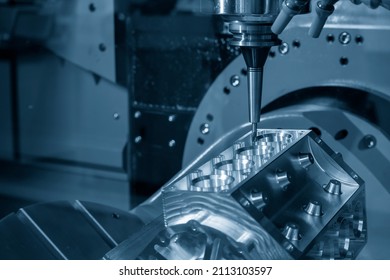 The  5-axis machining center cutting the v8-engine cylinder block by solid ball endmill tool. The 5-axis milling machine cutting the aluminum cylinder block manufacturing process. 