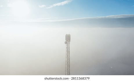 5g and 6g mobile network tower above mist