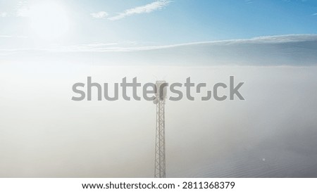 5g and 6g mobile network tower above mist