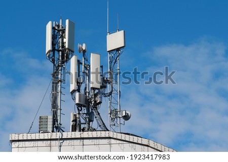 5G Cell Towers on sky background