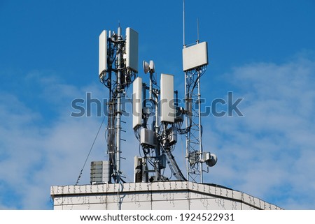 5G Cell Towers on sky background