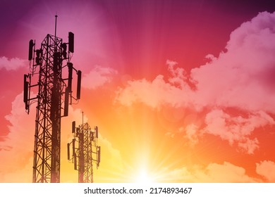 5G Communication Tower Or 4G Network Telephone Cellsite Silhouette On Sunny Colorful Sky Background.