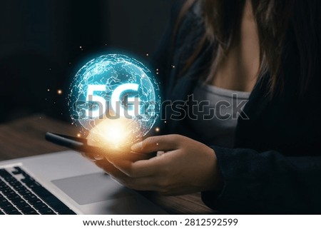 5G global network technology concept with digital globe above smartphone, representing high speed mobile communication, wireless connectivity, internet infrastructure and future telecommunications.