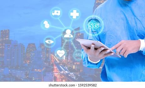 5G Internet Network With Surgeons Man Push 5G Button And Hold Tablet In Medical Uniform On White Background. 5G Internet Network With Healthcare Concept.