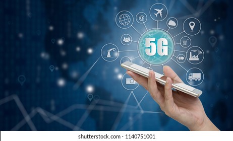 5G network wireless systems and internet of things, Smart city and communication network with smartphone in hand and objects icon connecting together,  Connect global wireless devices.