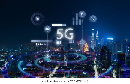 5G network wireless systems and internet of things with modern city skyline. Smart city and communication network concept . - Shutterstock ID 2147034857