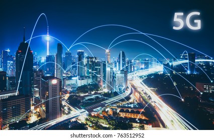 5G network wireless systems and internet of things with modern city skyline. Smart city and communication network concept . - Shutterstock ID 763512952