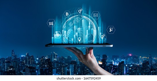 5G and Smart technology in modern city communication with graphic interface icon showing concept of digital transformation,internet of things (IOT), smart wireless and communication technology (ICT).