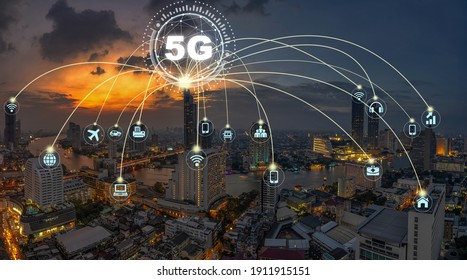 5G technology with Computer Network connection line between building over Panorama of Bangkok cityscape river side Modern building at Fantastic twilight time, Connectivity and global networks concept - Shutterstock ID 1911915151