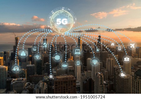 5G technology and computer network with internet of thing icon over Top view of Chicago Cityscape,USA downtown skyline, Architecture and building with tourist,Connectivity and global networks concept
