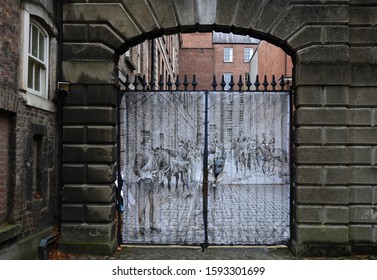  5th December 2019, Dublin, Ireland.  A See Through Screen Gate Cover On A Gate In Dublin Castle Off Dame Street. 