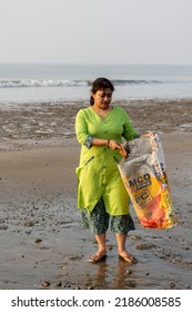 5th December, 2019, Tajpur Beach, West Bengal India: A Young Lady Cleaning Tajpur Beach, West Bengal, India. Fight Against Polution . Cean Beach Concept.