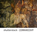 The 5th-century Bodhisattva Padmapani painting depicting Gautama Buddha holding a lotus flower at Ajanta Caves in Maharashtra, India.