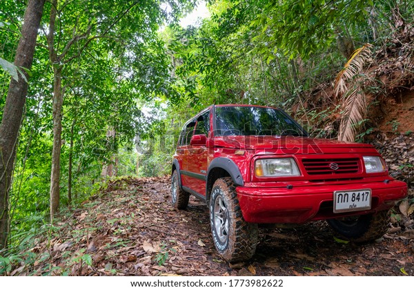 6 July 2020 Red 4x4 car Suzuki Vitara 1993 in\
the forest at Phuket Thailand