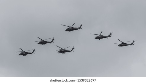 6 War Helicopters Flying In Strategy Formation