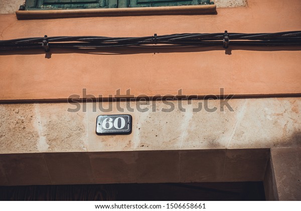 60 at door sign with power\
cable