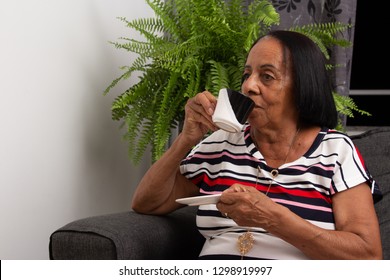 60 Year Old Woman Drinking Coffee.