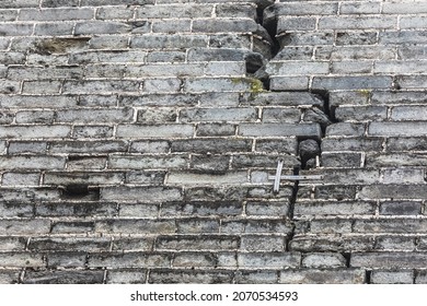 The 600-year-old Ming Dynasty City Wall in Xi'an, Shaanxi, China: A close-up of the brick body of the Xi'an city wall shot by a gun 100 years ago and natural cracks