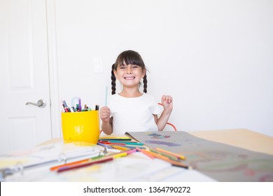 6-7 Years Old Girl Is Coloring