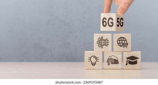 6G network technology. hand turns wooden cube and changes sign 5G to 6G. network global connection and internet network, new generation networks.