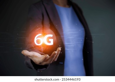 6G Technology networks Internet connecting wireless devices around the world. 6g icon in businessman hand. 6G technology is essential to businesses in the digital world.