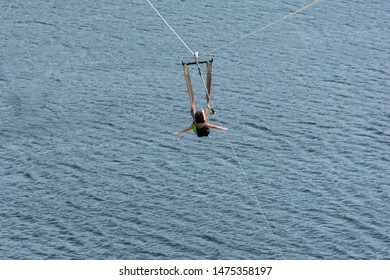 6-year-old Child Going Down With The Zip Line In The Jacomã Lagoon In The City Of Ceará-Mirim / RN-Brasil