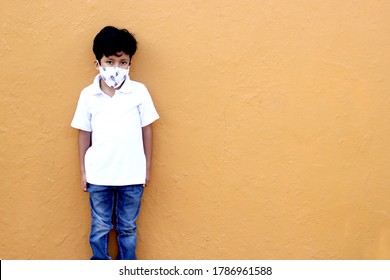 6-year-old Latino Boy Wearing A Face Mask For The New Normal