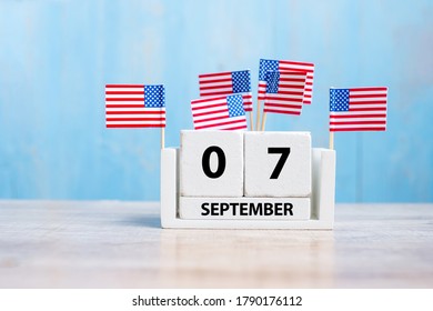 7 September Of White Calendar With United States Of America Flag On Wood Background. Copy Space For Text. Happy Labor Day 2020 And Holiday Concept