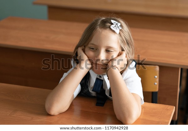 7 Year Old Girl Sits School Stock Photo Edit Now 1170942928