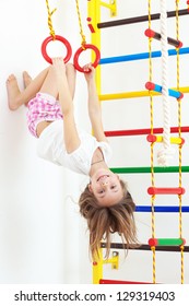 7 Years Old Child Playing On Sports Equipment