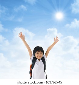 7 Years Old Pan Asian School Girl Arms Up In The Air