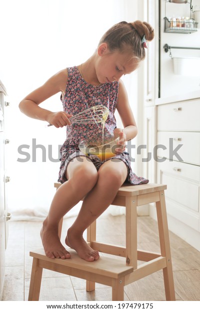 7 Years Old School Girl Cooking Stock Photo Edit Now 197479175