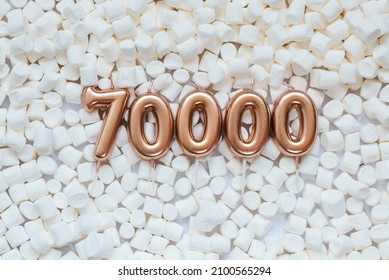 70000 followers card. Template for social networks, blogs. Background with white marshmallows. Social media celebration banner. 70k online community fans. 70 seventy thousand subscriber