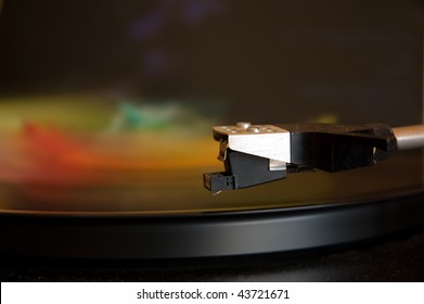 70's model turntable playing some colourful music