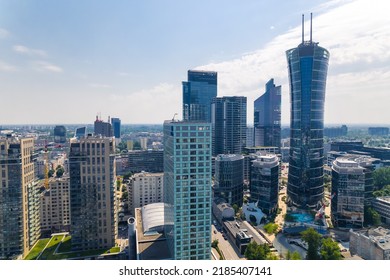 7.22.2022 Warsaw, Poland. Downtown District Full Of Neomodern Skyscraper Such As Warsaw Spire. Done Aerial Perspective. Sunny Day. High Quality Photo