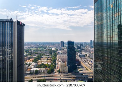 7.22.2022 Warsaw, Poland. Drone Aerial Shot. Oxford Tower On The Left Side. Developed City Cityscape. Human Interaction In Nature. High Quality Photo