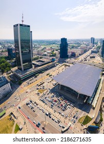 7.22.2022 Warsaw, Poland. Vertical Drone Aerial Shot Of Central Railway Station And Central LIM Skyscraper. Beautiful Weather. Transportation Concept. High Quality Photo