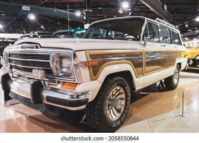 7.31.2021  - Sharjah, UAE: 1987 Jeep Grand Wagoner An American Classic Car With Wood Panels