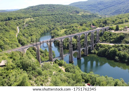 73m viaduct overhead a river in mountains