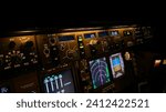 747 cockpit instruments by night