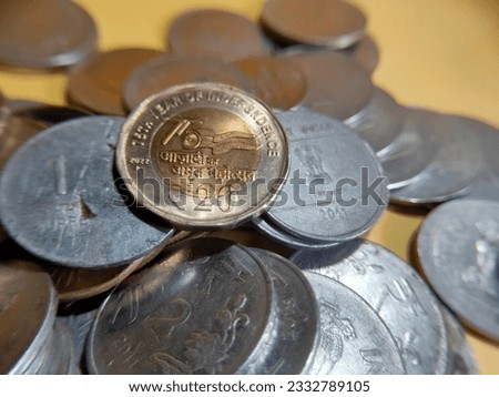 75 years of independence tribute 20 rupee Indian coin, close up image, highlighted 20 rupees coin, selective focus 