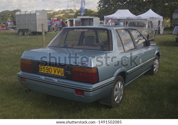7th August 2019- A classic\
Rover 216 EFi Vanden Plas, four door saloon car, being displayed at\
a vintage vehicle show in Lamphey, Pembrokeshire, Wales,\
UK.