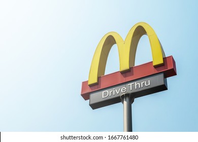 8 March 2020 , Chiang Mai , Thailand.
The Sign Or Emblem Of Mcdonald Drive Thru In The Sunny With The Blue Sky Background. 