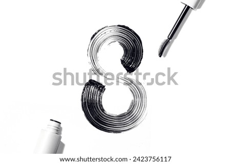 8 march international women's day. Smearing, swatch of mascara in the shape of a figure eight. Creative, minimalism poster white background flat lay