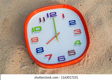 8 O'clock Over The Sand Background