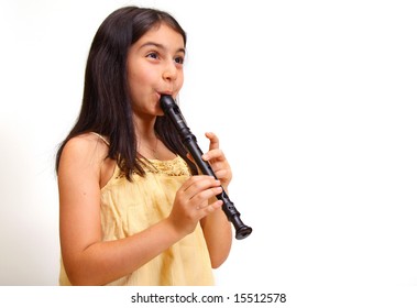 8 Year Old Girl Playing A Recorder