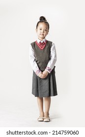 8 Year Old School Girl Smiling On White Background