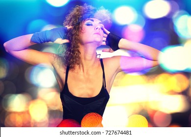 80's Fashion Woman Over Bokeh Background