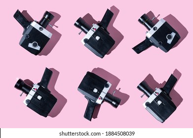 80s Film Camera On Pink Background With A Shadow