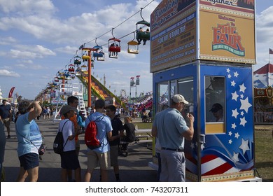 8-27-17 Syracuse, NY: People Stand In Line For Ride Tickets At The Great New York State Fair. 